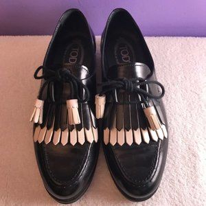 Tod's Black and White Loafers with tassles